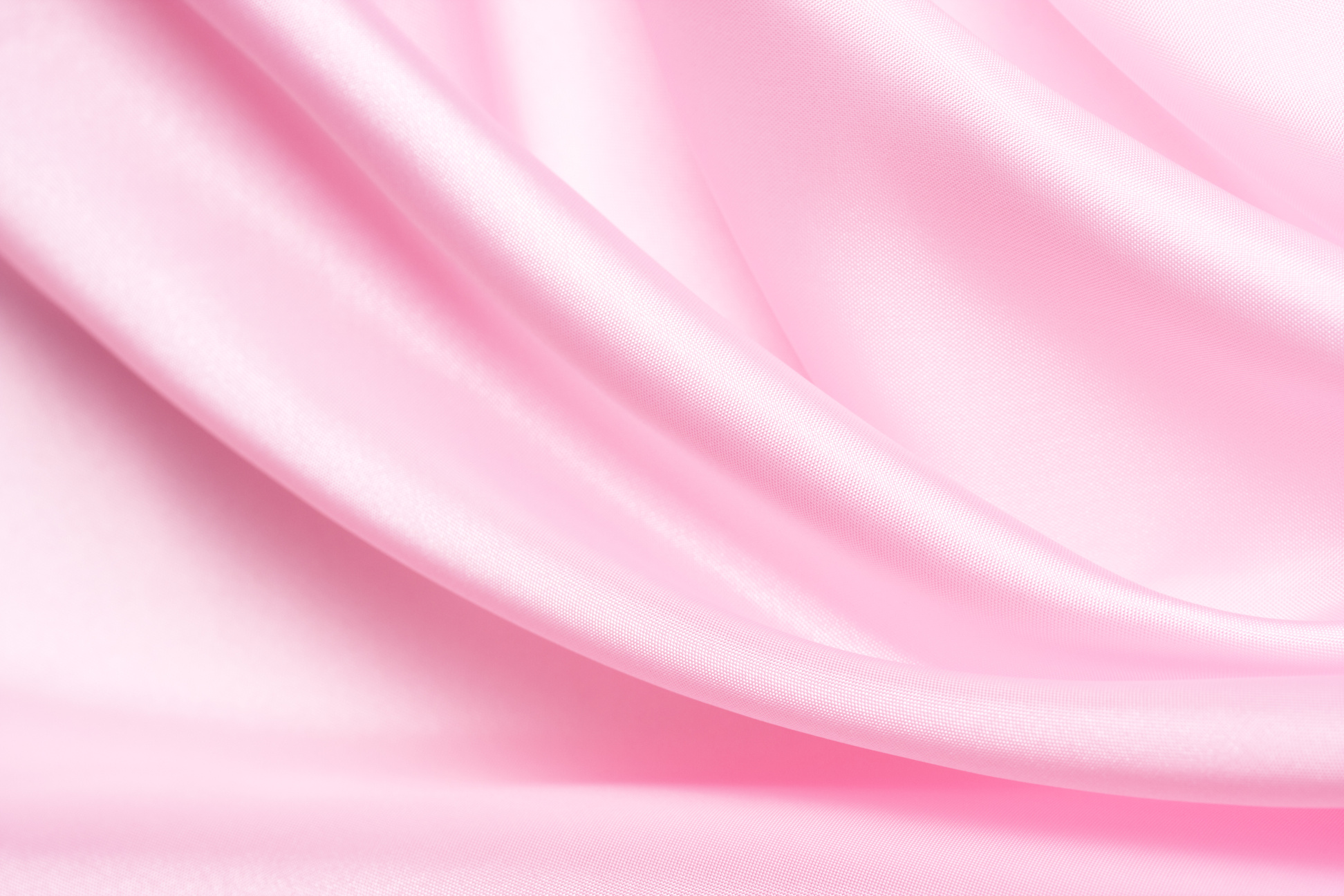 A piece of baby pink satin fabric